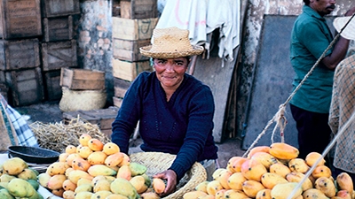 Selling Mangoes at a Market in Madagascar